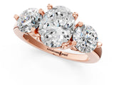 Rose gold Three-Stone Oval Brilliant Cut Solitaire Ring with Prong Setting on a Classic Band 1