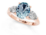 Rose gold Three-Stone Oval Cut Aquamarine Ring with Pear Side Stones and Four-Prong Setting_1