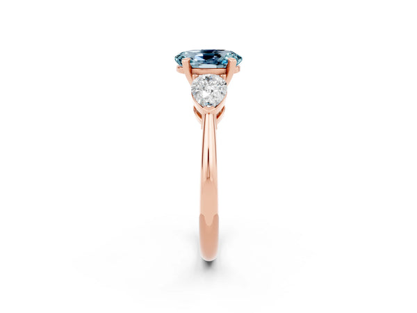 Rose gold Three-Stone Oval Cut Aquamarine Ring with Pear Side Stones and Four-Prong Setting