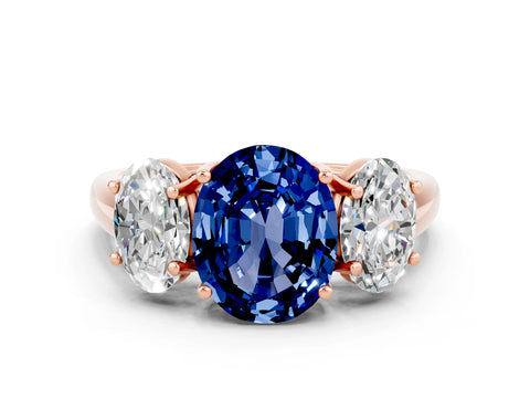 Rose gold Three-Stone Oval Cut Blue Sapphire Engagement Ring with Prong Setting