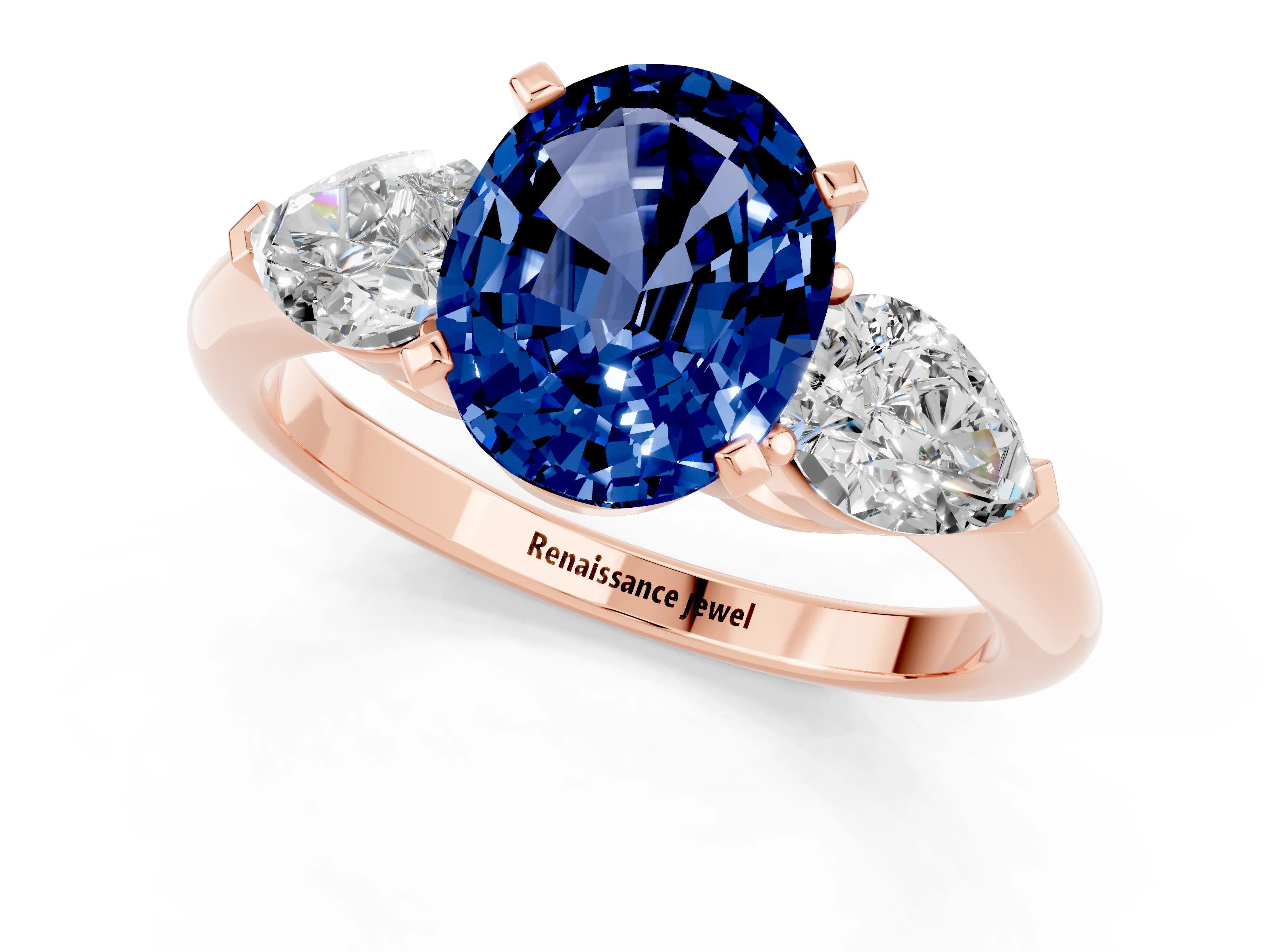 Rose gold Three-Stone Oval Cut Blue Sapphire Ring with Pear Side Stones and Four-Prong Setting_1