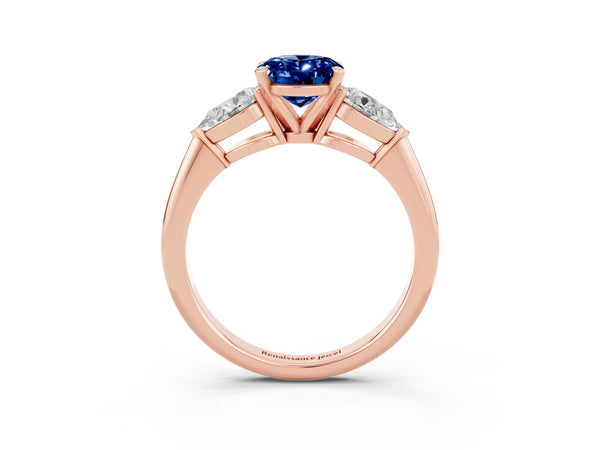 Rose gold Three-Stone Oval Cut Blue Sapphire Ring with Pear Side Stones and Four-Prong Setting