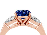 Rose gold Three-Stone Oval Cut Blue Sapphire Ring with Pear Side Stones and Four-Prong Setting_4