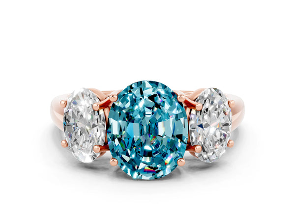 Rose gold Three-Stone Oval Cut Blue Topaz Engagement Ring with Prong Setting