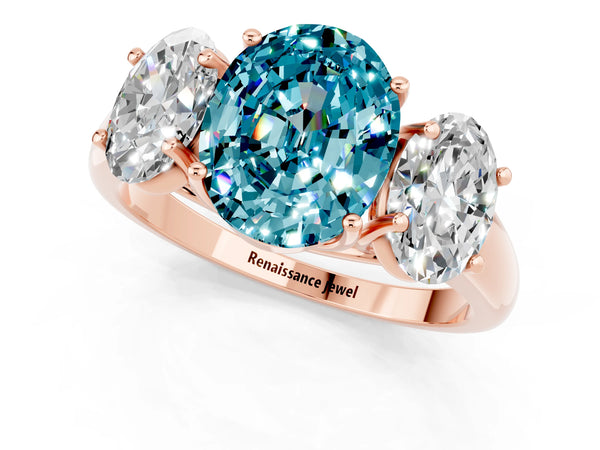 Rose gold Three-Stone Oval Cut Blue Topaz Engagement Ring with Prong Setting