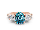 Rose gold Three-Stone Oval Cut Blue Topaz Pavé Band with Four-Prong Setting