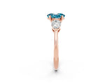 Rose gold Three-Stone Oval Cut Blue Topaz Ring with Pear Side Stones and Four-Prong Setting_2