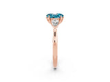 Rose gold Three-Stone Oval Cut Blue Topaz Ring with Pear  Side Stones in Four-Prong Setting_14