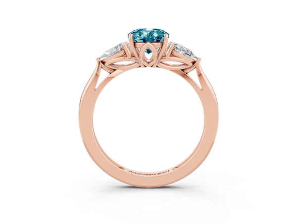 Rose gold Three-Stone Oval Cut Blue Topaz Ring with Pear  Side Stones in Four-Prong Setting