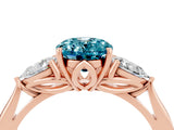 Rose gold Three-Stone Oval Cut Blue Topaz Ring with Pear  Side Stones in Four-Prong Setting_16