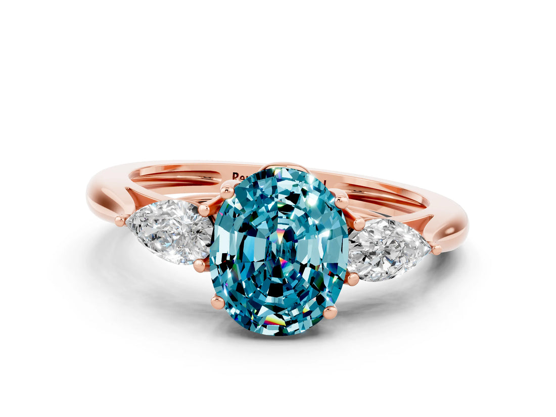 Rose gold Three-Stone Oval Cut Blue Topaz Ring with Pear  Side Stones in Four-Prong Setting_36