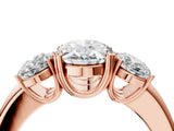 Rose gold Three-Stone Oval Cut Cut Diamond Ring with Channel Set Band and Four-Prong Setting_11