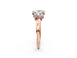 Rose gold Three-Stone Oval Cut Cut Diamond Ring with Channel Set Band and Four-Prong Setting_33