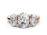 Rose gold Three-Stone Oval Cut Cut Diamond Ring with Channel Set Band and Four-Prong Setting_7