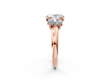 Rose gold Three-Stone Oval Cut Cut Diamond Ring with Channel Set Band and Four-Prong Setting_9