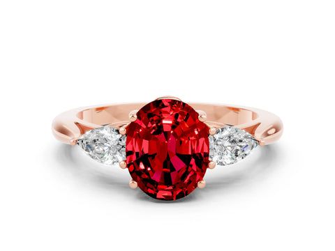 Rose gold Three-Stone Oval Cut Cut Diamond Ring with Pear Side Stones in Four-Prong Setting