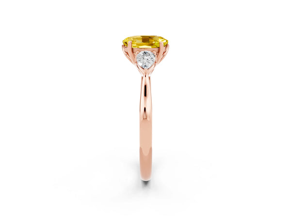 Rose gold Three-Stone Oval Cut Yellow Sapphire Ring with Pear  Side Stones in Four-Prong Setting