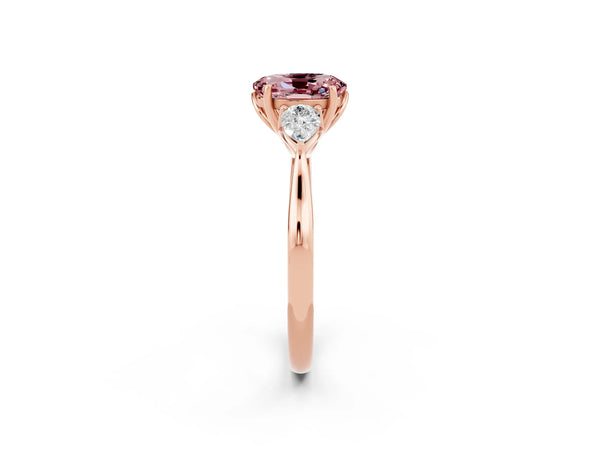 Rose gold Three-Stone Oval Cut Cut Diamond Ring with Pear Side Stones in Four-Prong Setting
