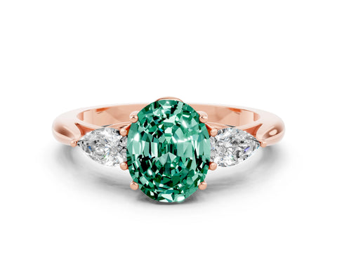 Rose gold Three-Stone Oval Cut Cut Diamond Ring with Pear Side Stones in Four-Prong Setting