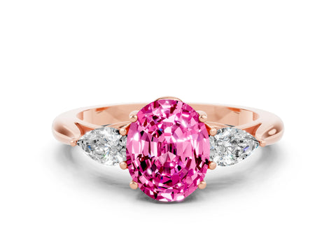Rose gold Three-Stone Oval Cut Cut Diamond Ring with Pear Side Stones in Four-Prong Setting