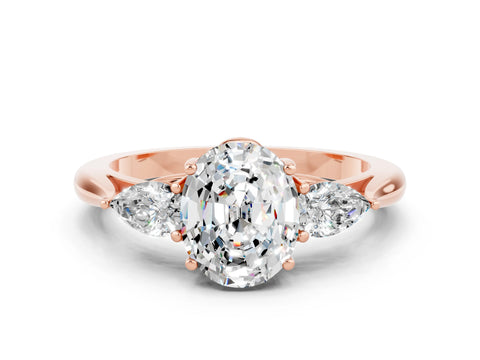 Rose gold Three-Stone Oval Cut Cut Diamond Ring with Pear Side Stones in Four-Prong Setting
