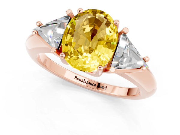 Rose gold Three-Stone Oval Cut Yellow Sapphire Engagement Ring with Trillion Side Stones and Prong Setting