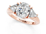 Rose gold Three-Stone Oval Cut Cut Diamond Ring with Trillion Side Stones and Four-Prong Setting_1