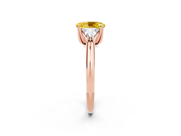 Rose gold Three-Stone Oval Cut Yellow Sapphire Engagement Ring with Trillion Side Stones and Prong Setting
