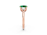 Rose gold Three-Stone Oval Cut Cut Diamond Ring with Trillion Side Stones and Four-Prong Setting_2