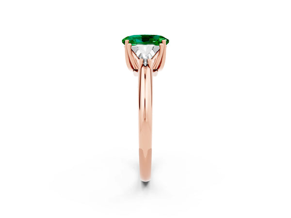 Rose gold Three-Stone Oval Cut Emerald Engagement Ring with Trillion Side Stones and Prong Setting
