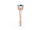Rose gold Three-Stone Oval Cut Cut Diamond Ring with Trillion Side Stones and Four-Prong Setting_2