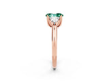 Rose gold Three-Stone Oval Cut Cut Diamond Ring with Trillion Side Stones and Four-Prong Setting_2