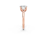 Rose gold Three-Stone Oval Cut Cut Diamond Ring with Trillion Side Stones and Four-Prong Setting_2