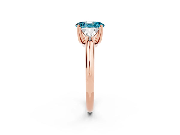 Rose gold Three-Stone Oval Cut Cut Diamond Ring with Trillion Side Stones and Four-Prong Setting