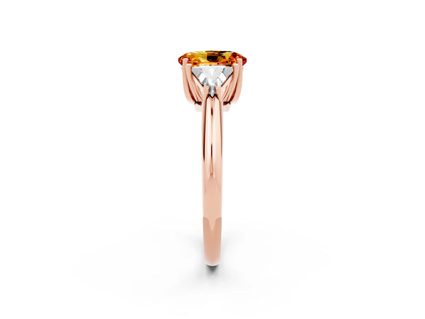 Rose gold Three-Stone Oval Cut Citrine Engagement Ring with Trillion Side Stones and Prong Setting