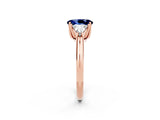 Rose gold Three-Stone Oval Cut Cut Diamond Ring with Trillion Side Stones and Four-Prong Setting_2