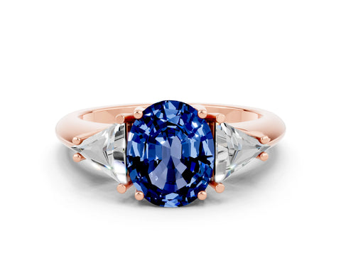 Rose gold Three-Stone Oval Cut Cut Diamond Ring with Trillion Side Stones and Four-Prong Setting