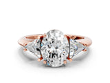 Rose gold Three-Stone Oval Cut Cut Diamond Ring with Trillion Side Stones and Four-Prong Setting_3