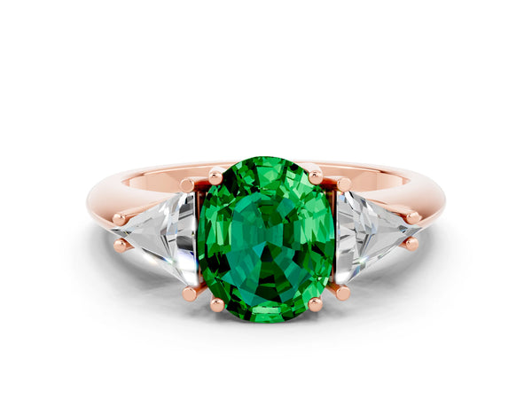 Rose gold Three-Stone Oval Cut Emerald Engagement Ring with Trillion Side Stones and Prong Setting