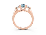 Rose gold Three-Stone Oval Cut Cut Diamond Ring with Trillion Side Stones and Four-Prong Setting_3