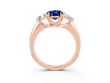 Rose gold Three-Stone Oval Cut Cut Diamond Ring with Trillion Side Stones and Four-Prong Setting_3