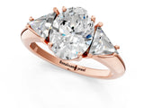 Rose gold Three-Stone Oval Cut Cut Diamond Ring with Trillion Side Stones and Four-Prong Setting_4