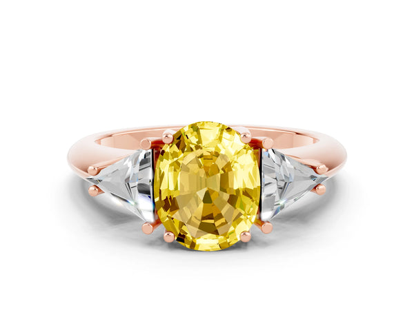 Rose gold Three-Stone Oval Cut Yellow Sapphire Engagement Ring with Trillion Side Stones and Prong Setting