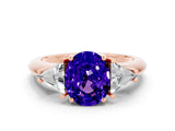 Rose gold Three-Stone Oval Cut Cut Diamond Ring with Trillion Side Stones and Four-Prong Setting