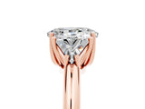 Rose gold Three-Stone Oval Cut Cut Diamond Ring with Trillion Side Stones and Four-Prong Setting_5