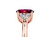 Rose gold Three-Stone Oval Cut Cut Diamond Ring with Trillion Side Stones and Four-Prong Setting_5