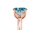 Rose gold Three-Stone Oval Cut Cut Diamond Ring with Trillion Side Stones and Four-Prong Setting_5