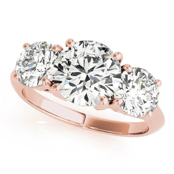 Rose gold Three-Stone Oval Cut Diamond Engagement Ring with Prong Setting on a White Gold Band