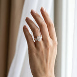Rose gold Three-Stone Oval Cut Diamond Engagement Ring with Prong Setting on a White Gold Band_18