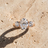 Rose gold Three-Stone Oval Cut Diamond Engagement Ring with Prong Setting on a White Gold Band_21